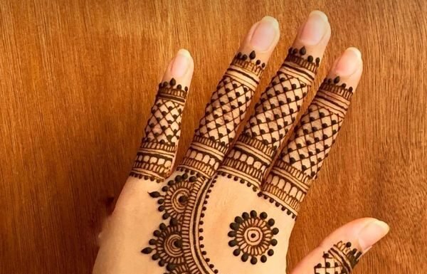 Beyond the Palm: 9 Stunning Back Hand Mehndi Designs